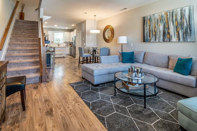 a%20living%20room%20with%20grey%20and%20blue%20decor a%20living%20room%20with%20grey%20and%20blue%20decor